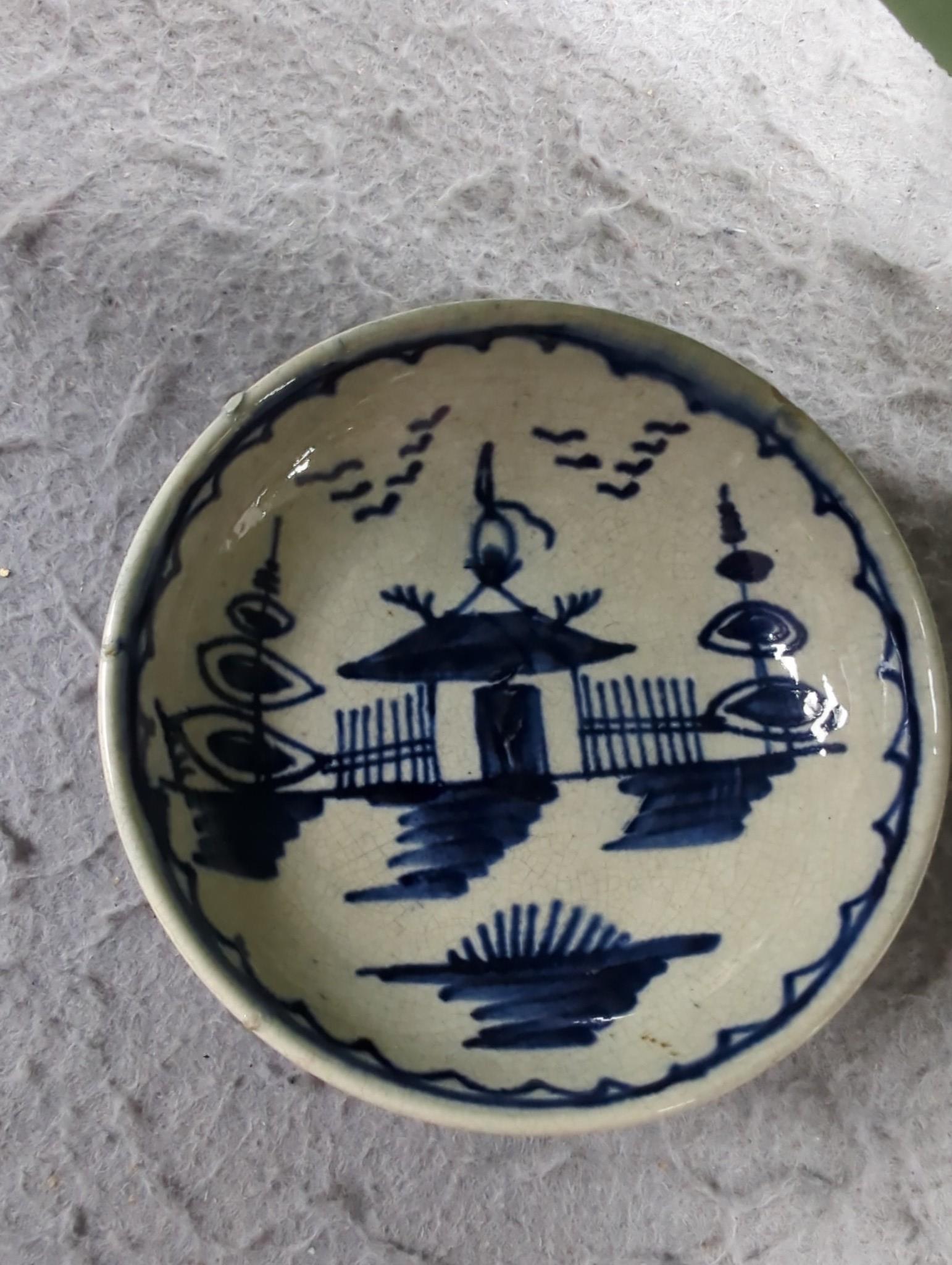 A late 18th century pearlware blue and white miniature jug, 5cm, and tea bowl and an English porcelain miniature mug, late 18th century